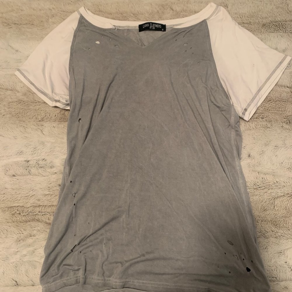 LUXX top with distressed holes